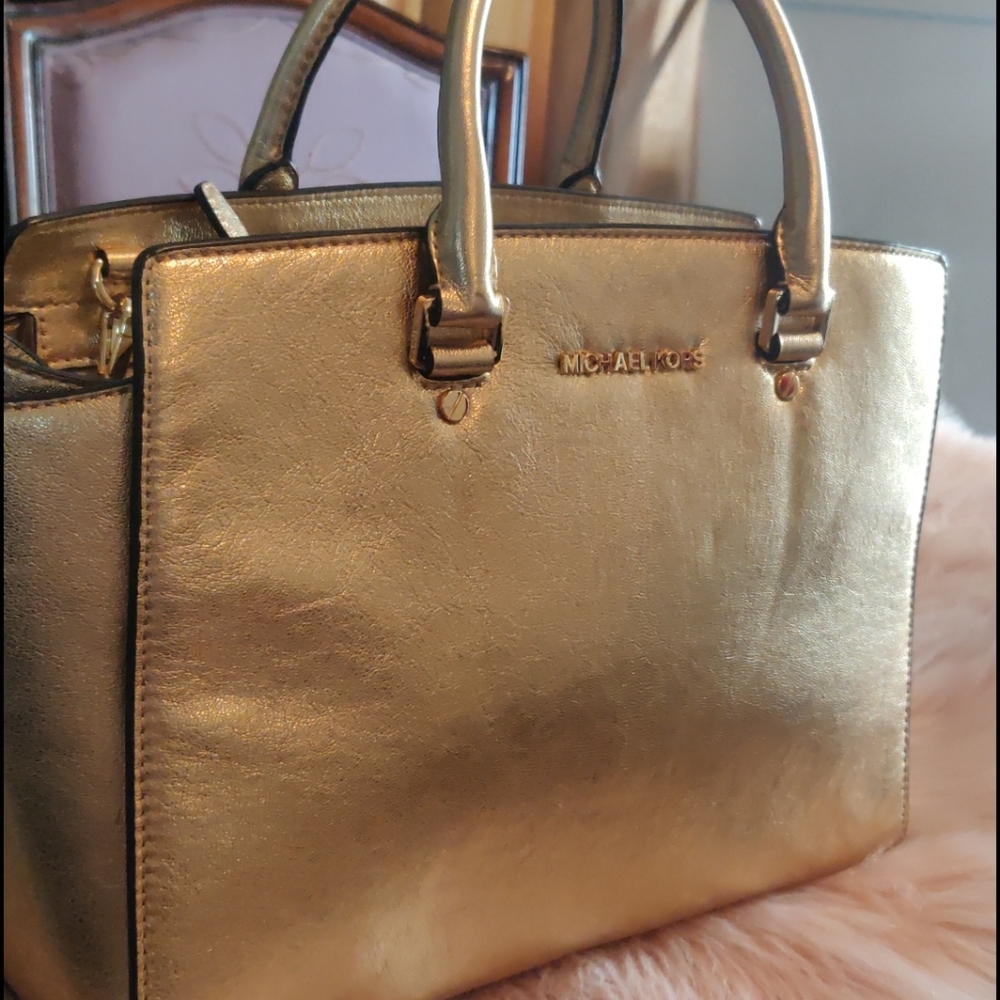 Michael Kors gold color handbag